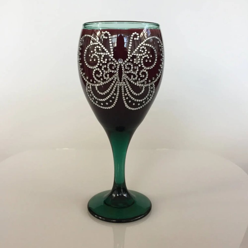Handmade green tinted wine glass. Two-Sided butterfly designs. Silver rhinestone
